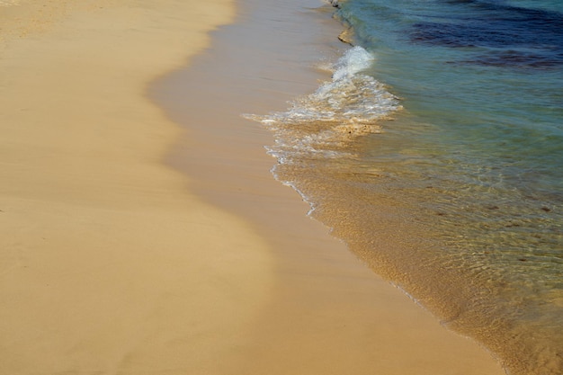 Waves with foam on the Atlantic coast in Cape Verde