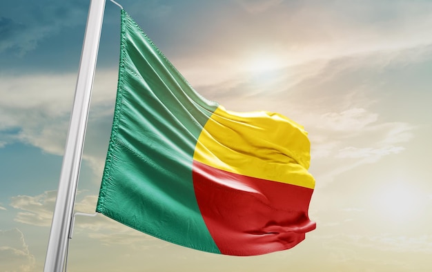Waving Flag of Benin in the Sky. The symbol of the state on wavy cotton fabric.