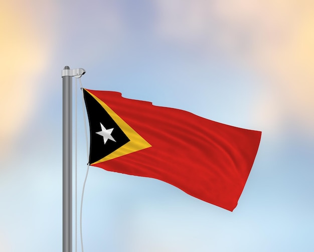 Waving flag of East Timor on a flagpole