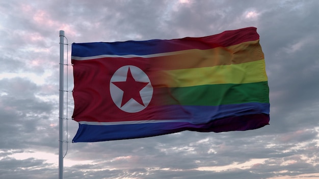 Waving flag of North Korea state and LGBT rainbow flag