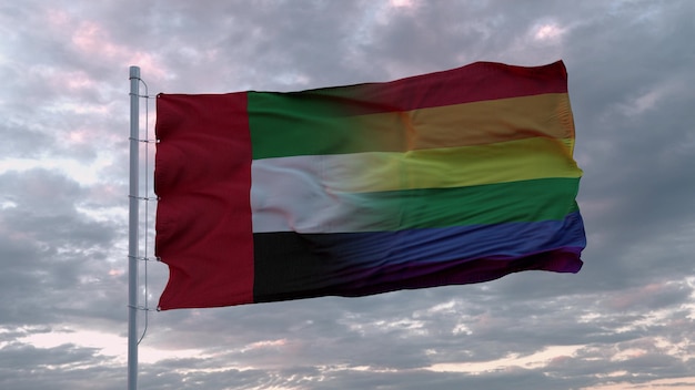 Waving flag of United Arab Emirates and LGBT rainbow flag