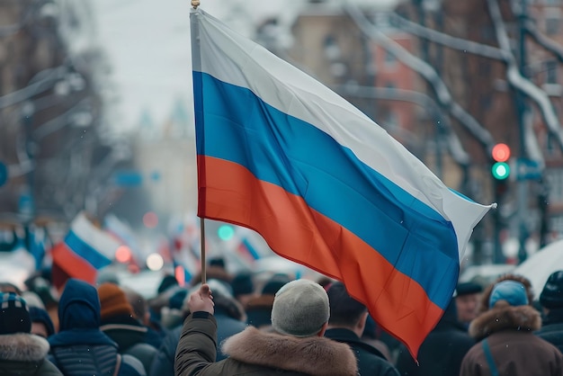 Photo waving russian flag in a crowd on street