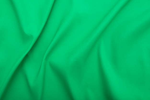 Wavy green fabric, cloth fabric texture or background