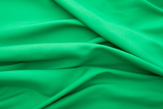 Wavy green fabric, cloth fabric texture or background