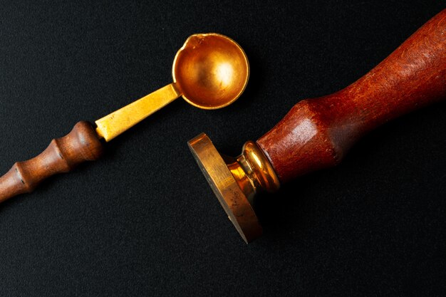 Wax seal stamp on dark black background