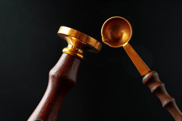 Wax seal stamp on dark black background