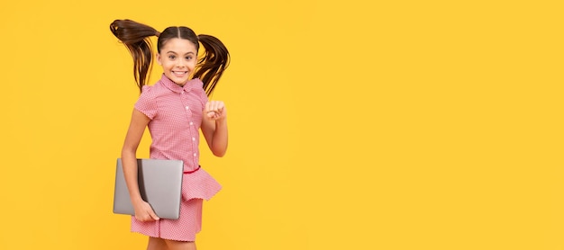 On way to success back to school modern digital communication School girl portrait with laptop horizontal poster Banner header with copy space