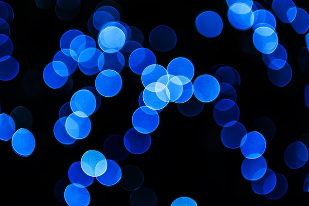 Foto wazig glanzende achtergrond met blauwe lichten en bokeh