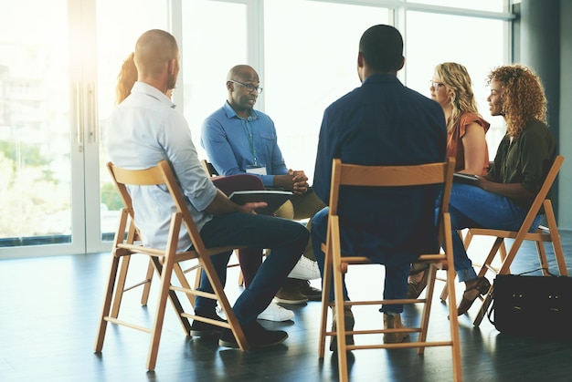 We aim to do something creative everyday Shot of a group of diverse creative employees having a meeting inside