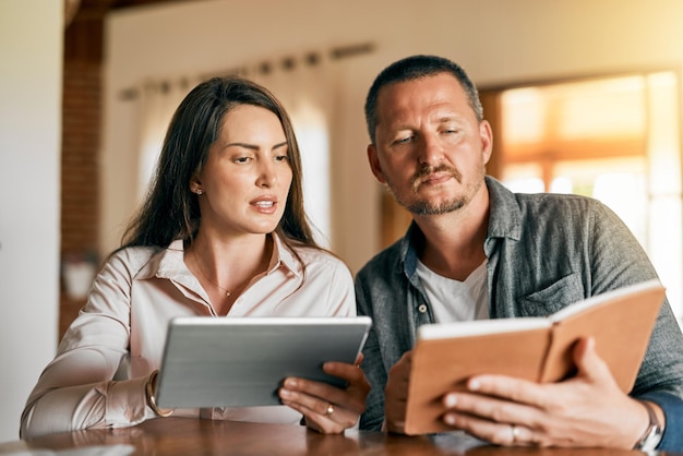 We have to see what we can do about this plan Cropped shot of a married couple planning their financial budget at home