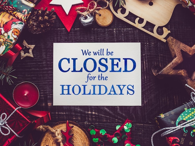 Photo we'll be closed for the holidays. signboard