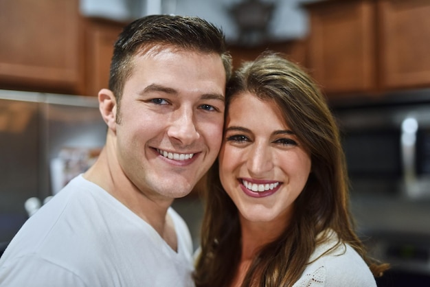 We love spending time together Shot of young couple spending their day indoors