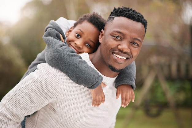 We share in the most special connection Portrait of a father and his son having fun while bonding together outdoors