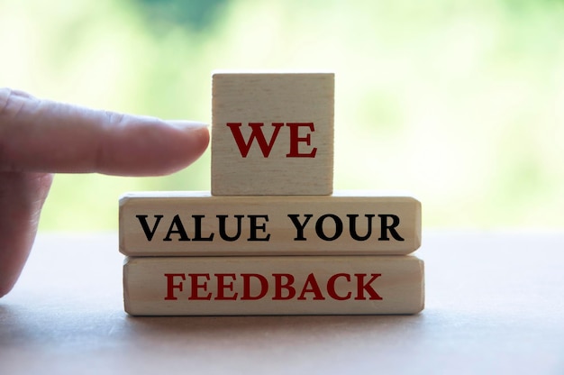 We value your feedback text on wooden blocks Feedback and review concept