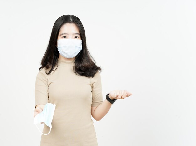 Wearing Medical Mask for Preventing Corona Virus Of Beautiful Asian Woman Isolated On White