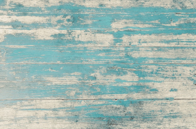 Weathered blue painted wooden wall background