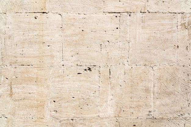 Weathered limestone wall background texture