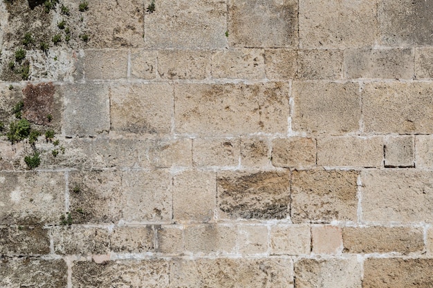 Photo weathered outdoors stone brick texture background