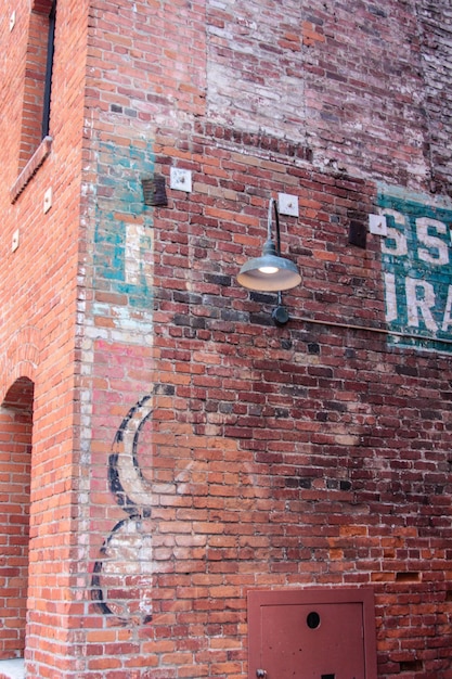 Weathered red brick wall