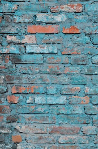 Weathered and stained old brick wall texture