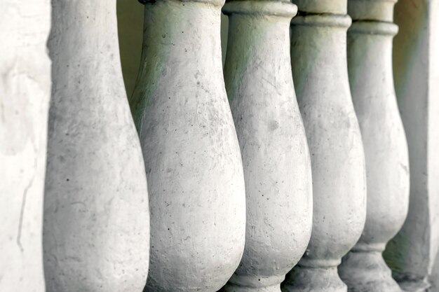 Weathered stone railing at temple