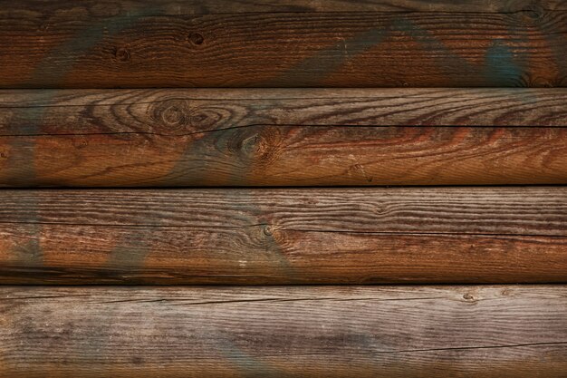 Weathered wood texture with paint spots.