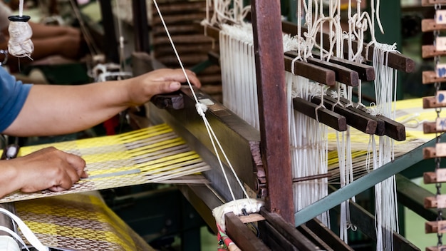 weave and Thai silk. activity involving skill in making things by hand