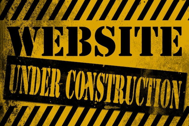 Photo website under construction sign yellow with stripes