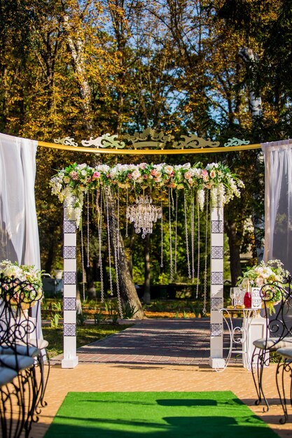 Wedding arch and chairsWedding ceremony decoration The newlyweds