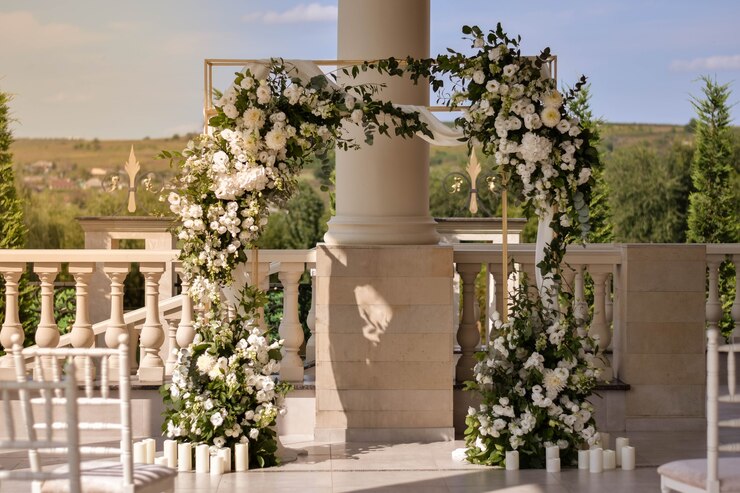 Wedding arch with white flowers arrangements.Wedding decor.