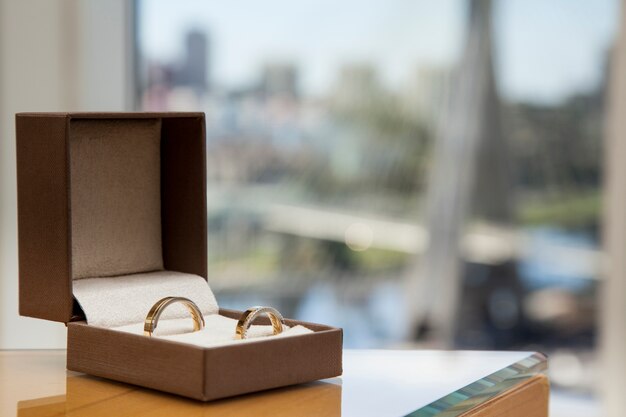 wedding band with a blurred cable-stayed bridge in Sao Paulo, Brazil.