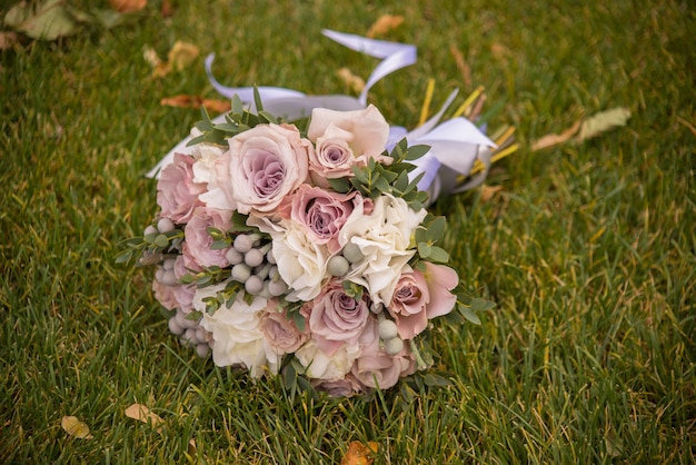 wedding beautiful bridal bouquet on the grass