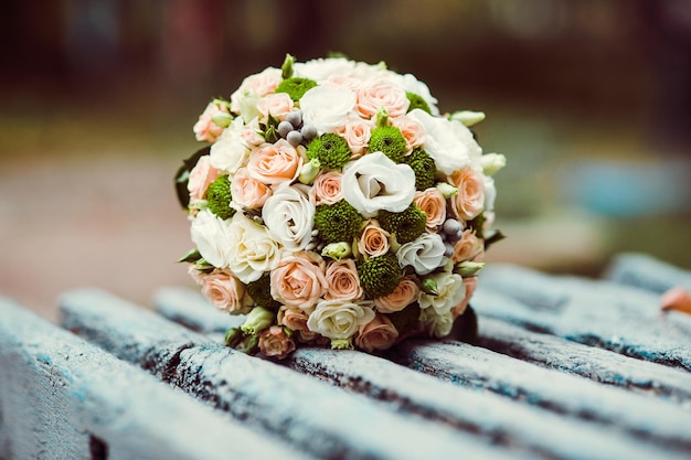 Wedding bouquet on a bench