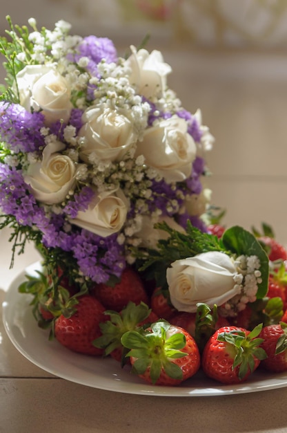 Wedding bouquet and boutonniere of white roses