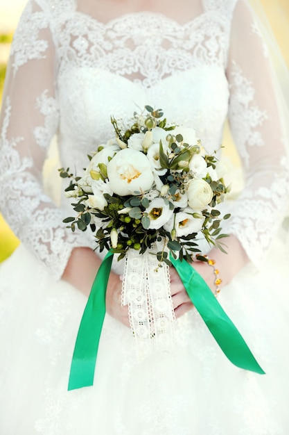 Wedding bouquet in bride's hands