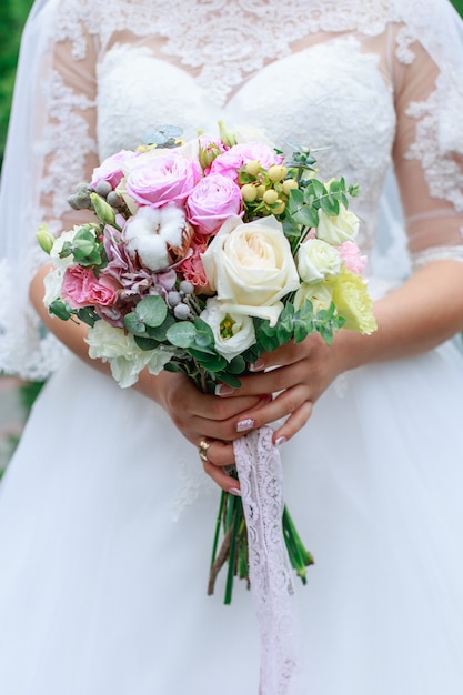 Wedding bouquet of flowers including Red hypericum