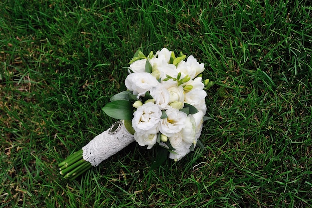 Wedding bouquet in the grass