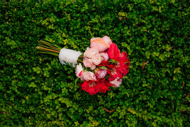 Wedding bouquet on a green background