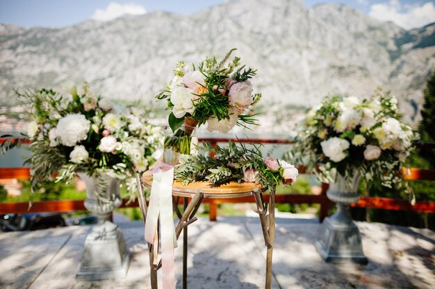 Wedding bouquet orchids and peonies Fine art wedding bouquet and flowers background