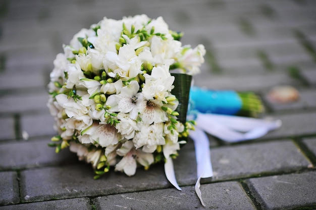 Wedding bouquet on the pavement