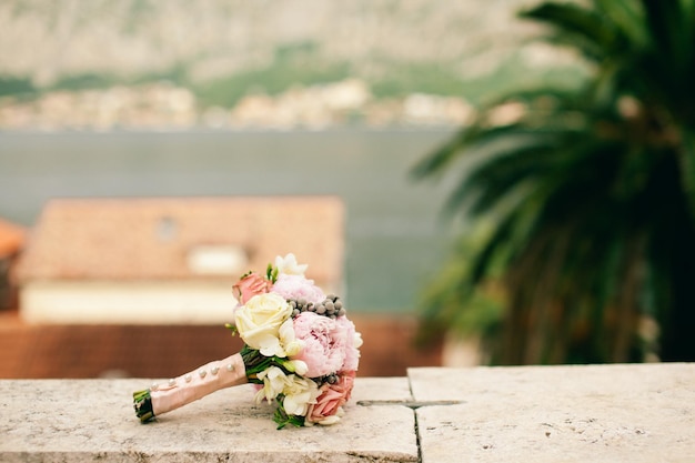 Wedding bouquet of rose peonies and roses Wedding fine art style