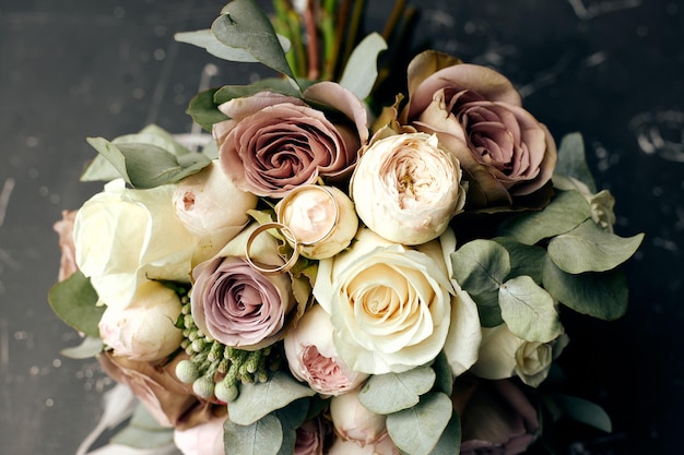 Wedding bouquet of roses of beige tones