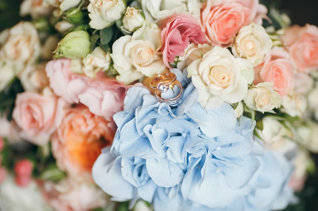 Wedding bouquet of roses with rings