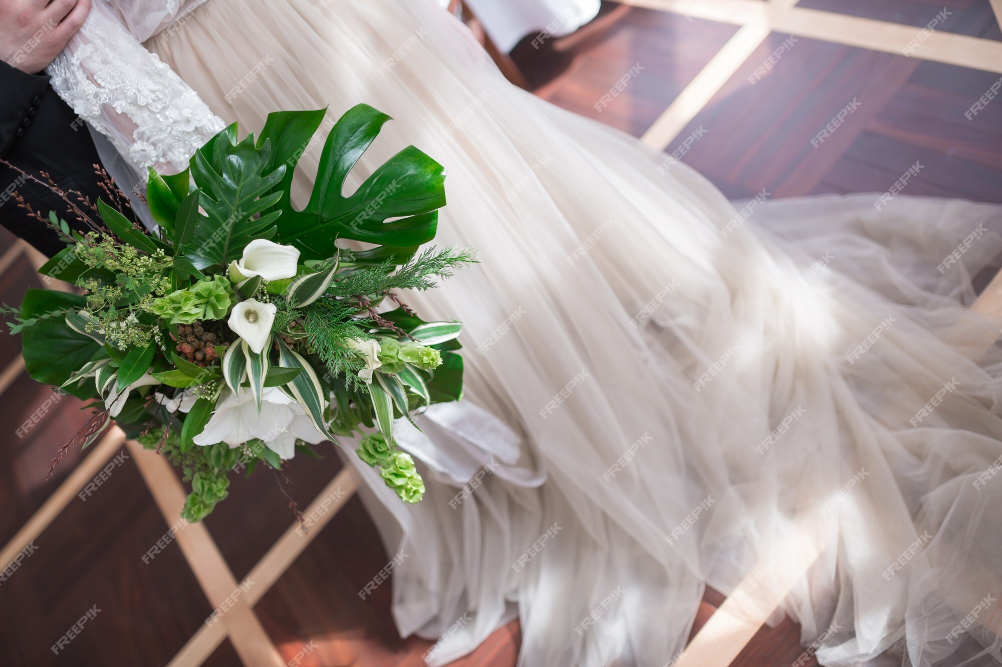 Premium Photo | Wedding bouquet of tropical flowers blossom tropical  flowers and palm leaves