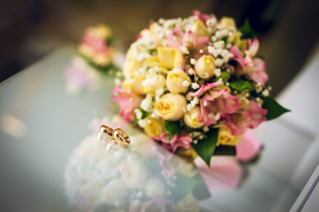 Wedding bouquet and wedding rings