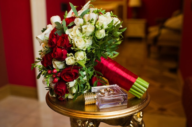 Wedding bouquet of white and red roses