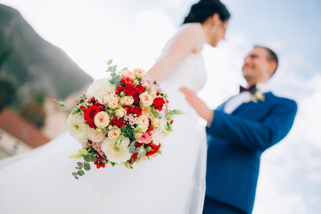 Wedding bridal bouquet of roses chrysanthemums eucalyptus baby