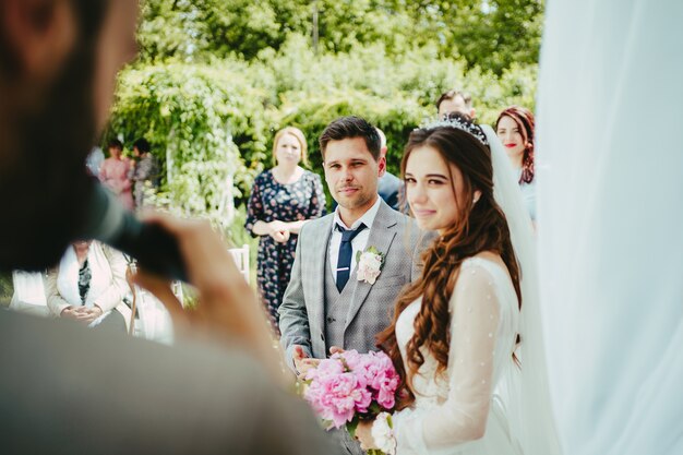 Wedding. The bride and groom sign up