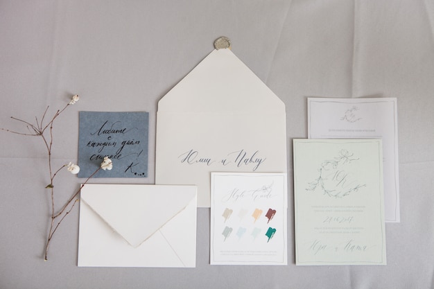 Wedding calligraphy Envelope and a letter with inscriptions in Russian. Translation: "Love more every day" and " Julia and Paul"