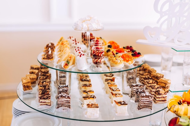 Wedding candy bar Delicious sweet buffet with cupcakes